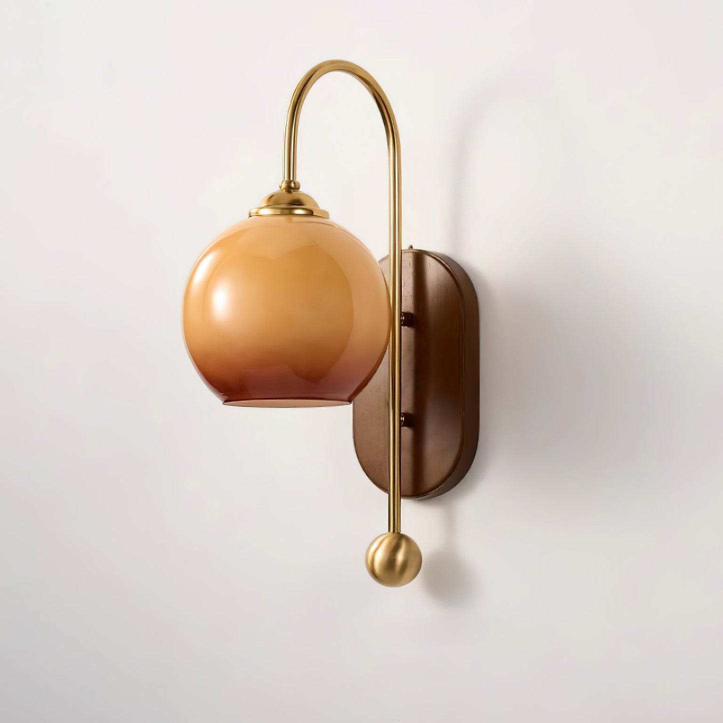 Elegant Wall Lamp with Amber Glass and Brass Arm | Modern Lighting for a Pleasant Atmosphere in the Living Room