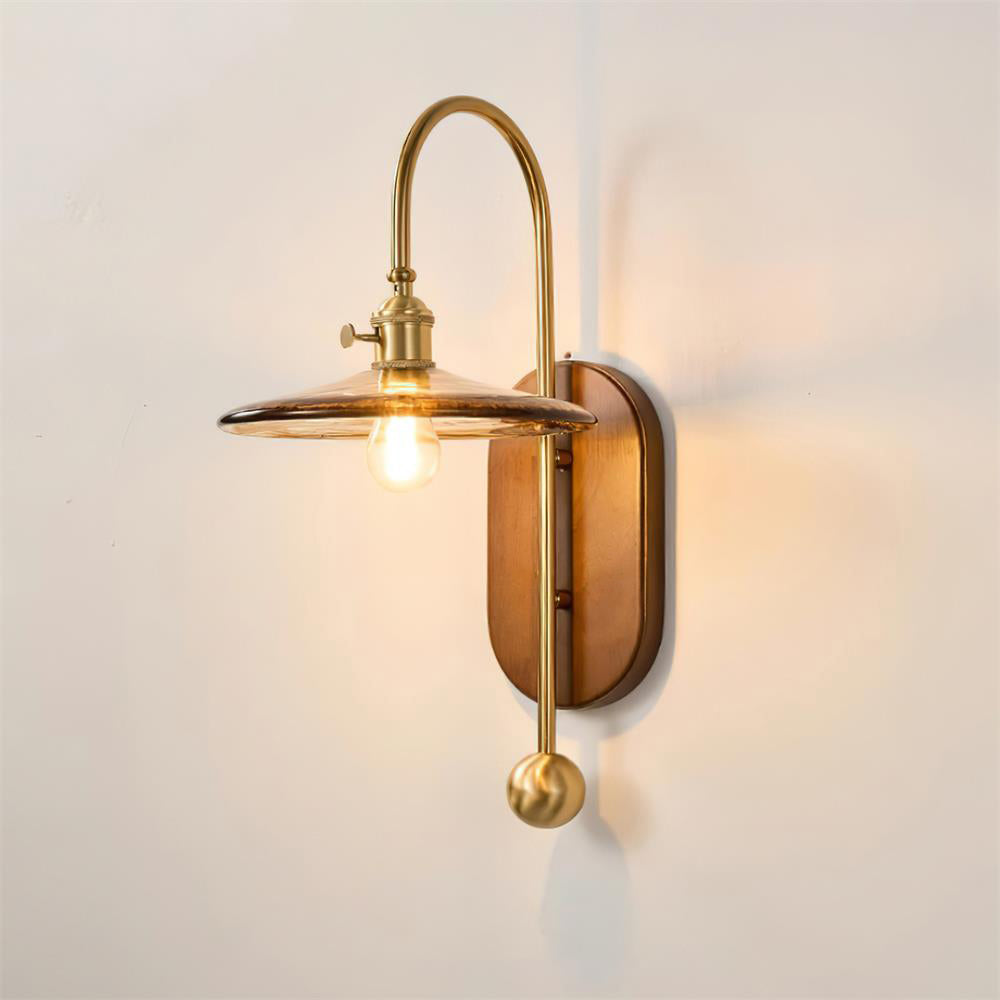 Elegant Wall Lamp with Amber Glass and Brass Arm | Modern Lighting for a Pleasant Atmosphere in the Living Room