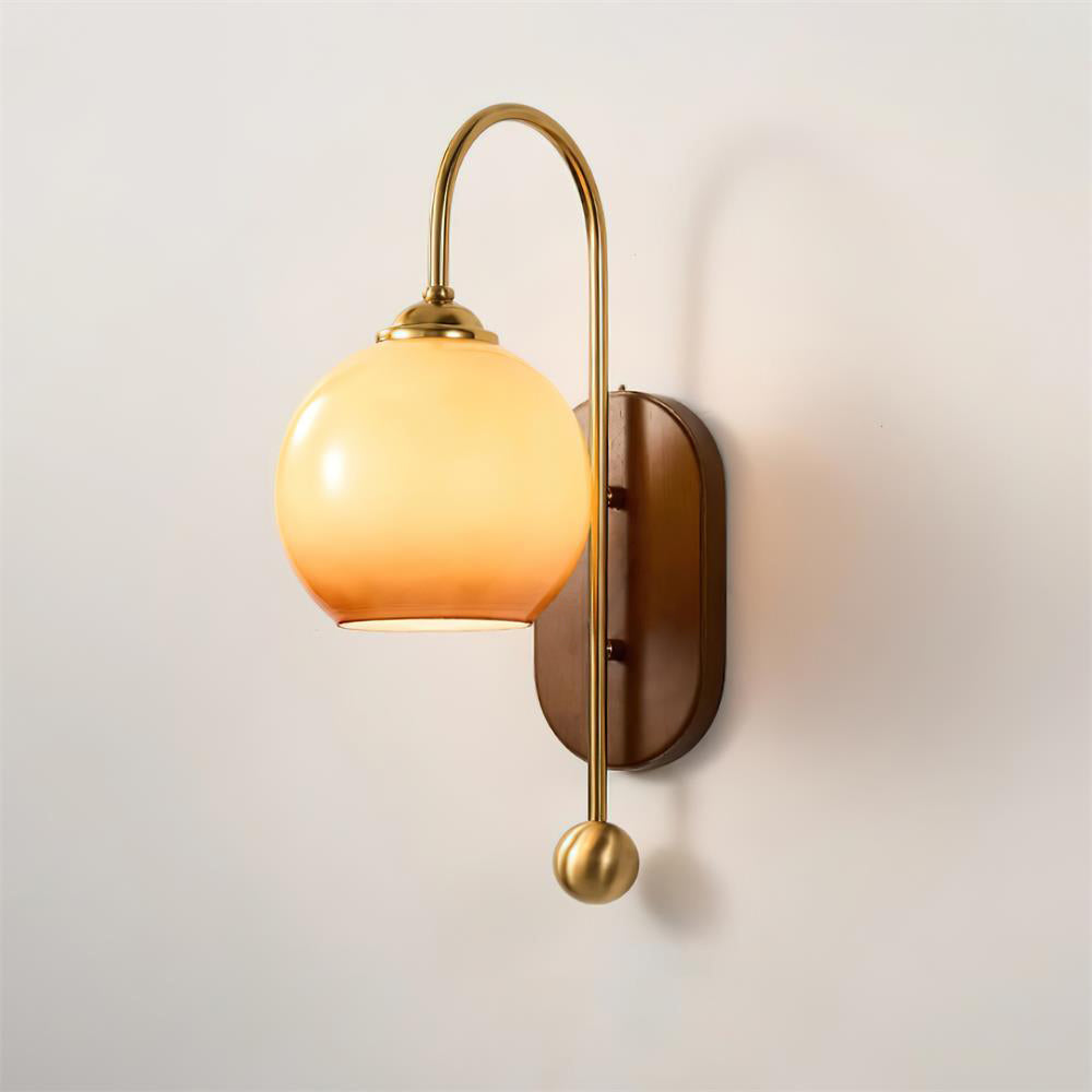 Elegant Wall Lamp with Amber Glass and Brass Arm | Modern Lighting for a Pleasant Atmosphere in the Living Room