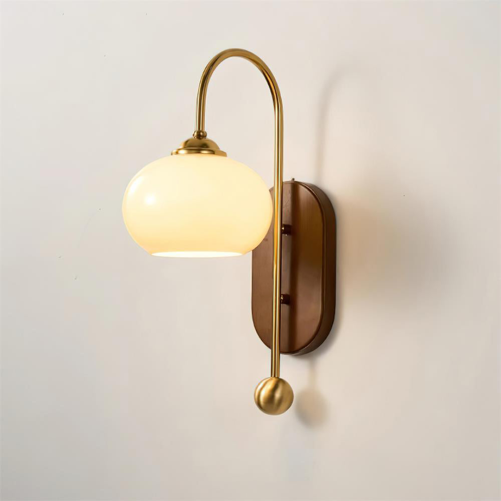 Elegant Wall Lamp with Amber Glass and Brass Arm | Modern Lighting for a Pleasant Atmosphere in the Living Room