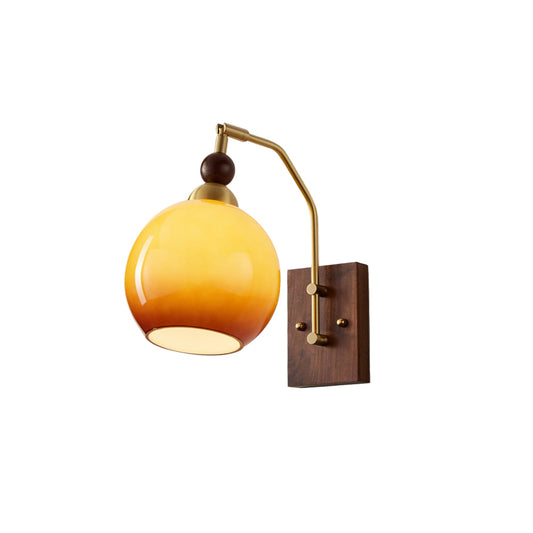Elegant Wall Sconce Lighting with Caramel Glass Shade and Adjustable Arm for Modern Interiors