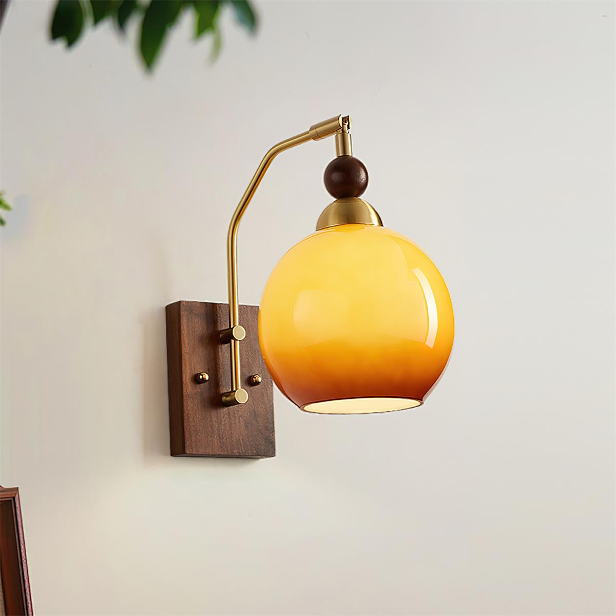 Elegant Wall Sconce Lighting with Caramel Glass Shade and Adjustable Arm for Modern Interiors